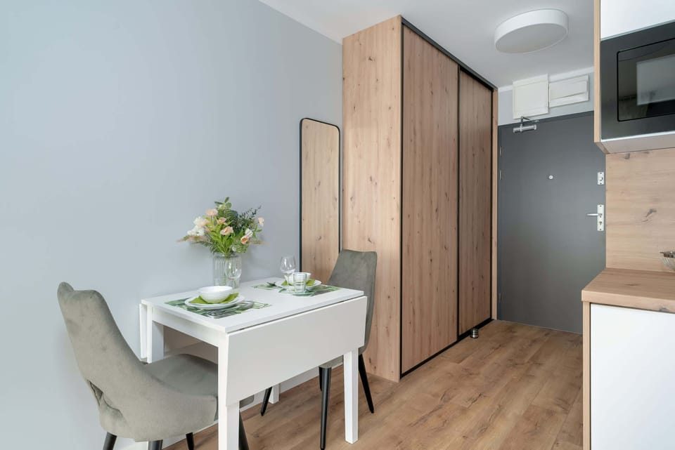 Cosy living area with a capacious wardrobe.