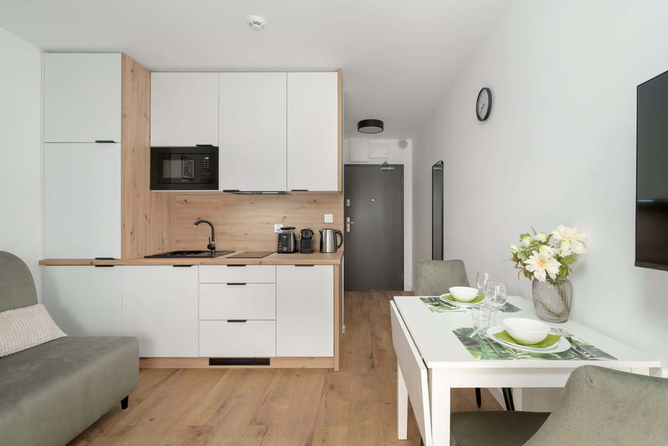 Practical kitchenette in bright hues.