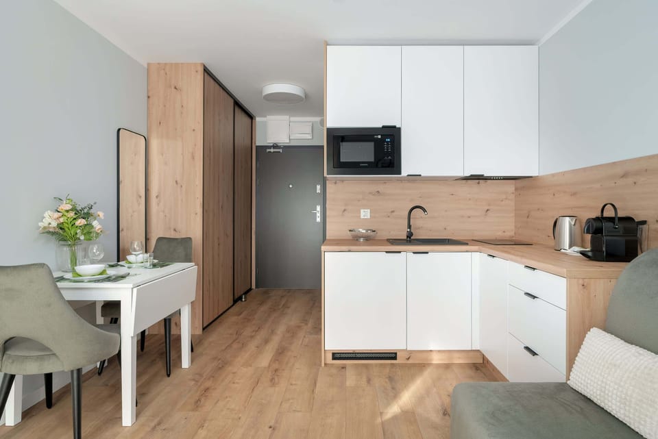 Practical kitchenette located next to the dining area.