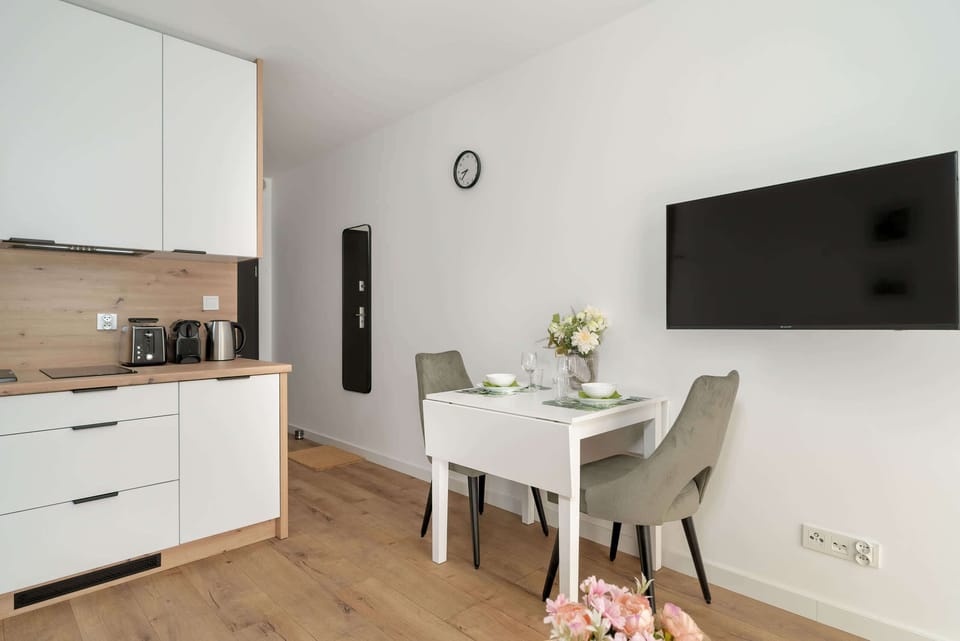 Cosy living area with a modern television.