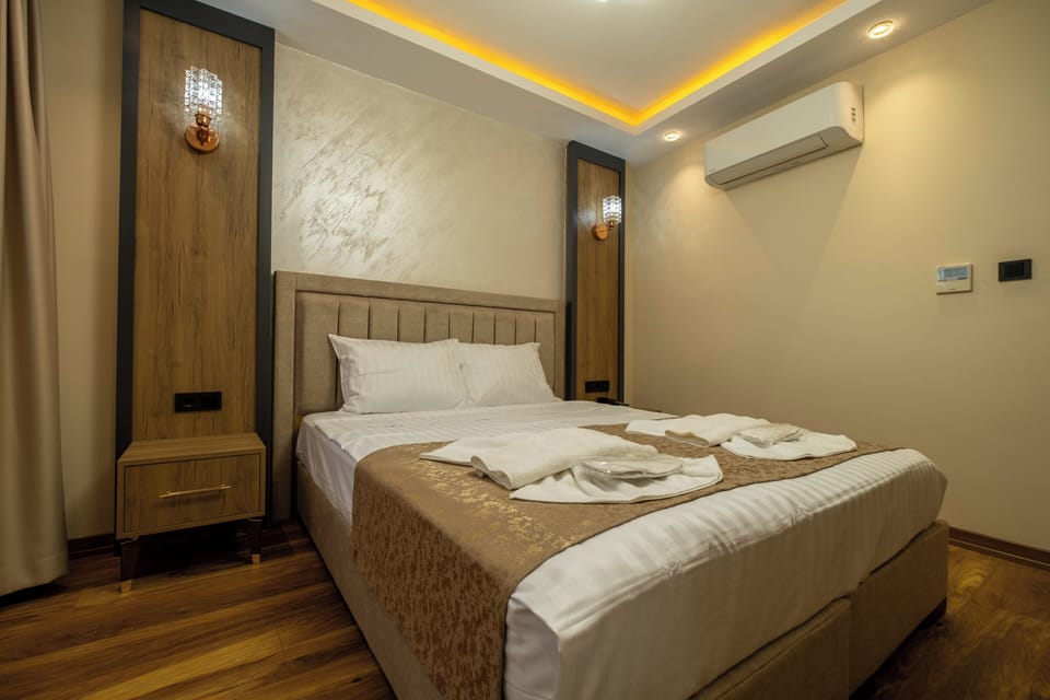 Premium bedding, down comforters, Select Comfort beds, minibar