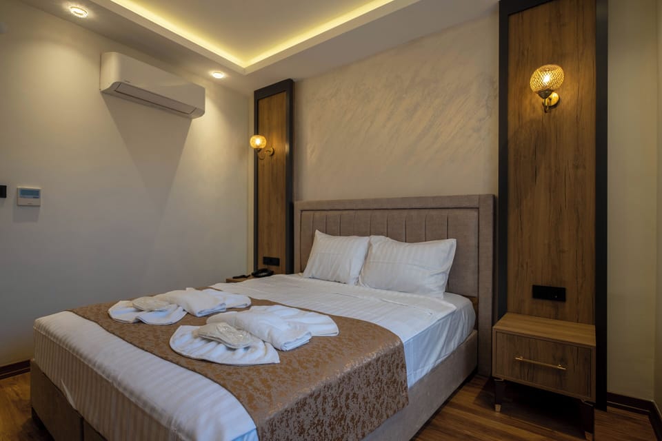 Premium bedding, down comforters, Select Comfort beds, minibar