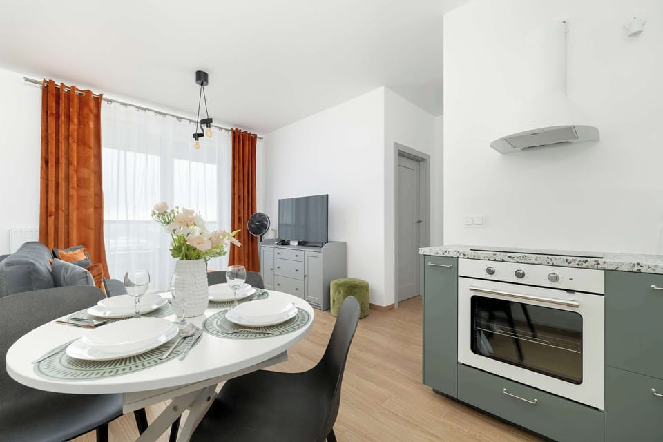 Functional yet stylish, the kitchenette has high-quality appliances such as an oven, hob, dishwasher and fridge. The cupboards contain the necessary utensils for preparing home-cooked meals.