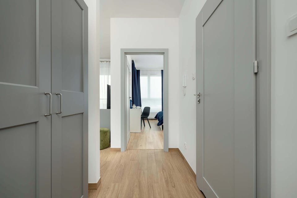 A well-lit and clean corridor with easy access to the apartment, ensuring comfort and safety.