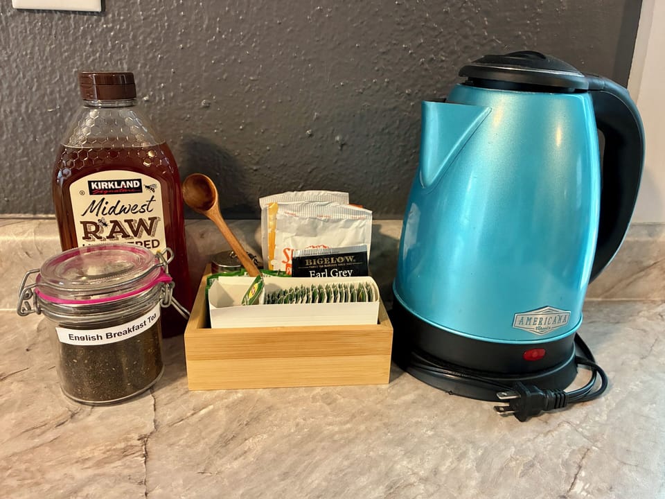 Electric kettle, air fryer, green and black tea, sugar packets