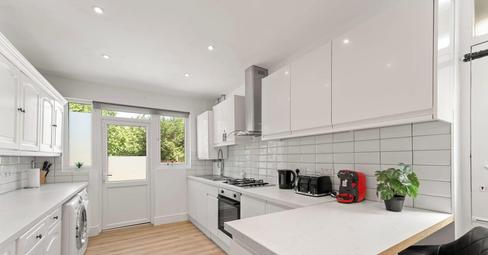 A bright and clean kitchen that’s fully equipped with everything you need—perfect for cooking, snacking, or enjoying a quiet cup of coffee.
