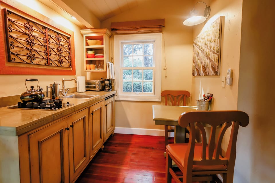 Mini-fridge, microwave, stovetop, cookware/dishes/utensils