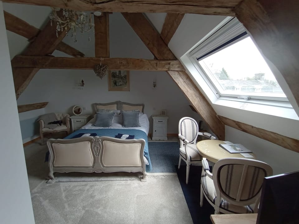 Deluxe Double Room, Garden View | In-room safe, blackout drapes, iron/ironing board, free WiFi