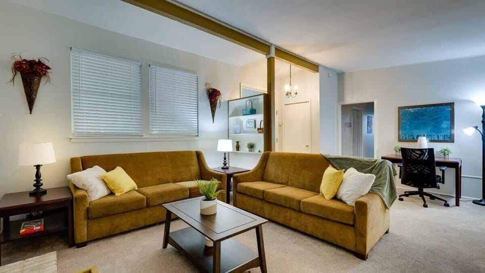 Cozy living area with comfortable seating, wooden furniture, and a welcoming feel.