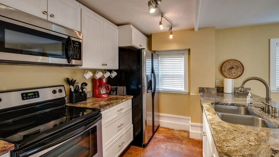 Updated kitchen with efficient layout and ample counter space.