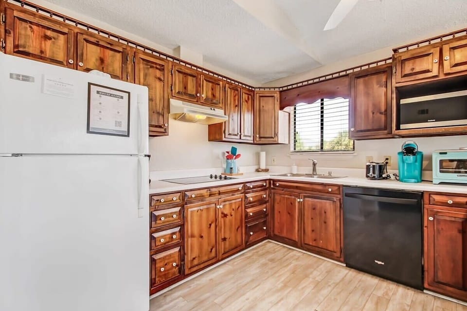 Well-equipped kitchen with ample counter space and modern appliances.