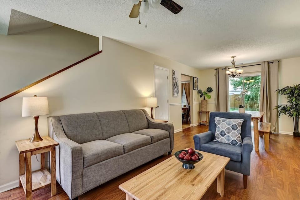 Living room with a sofa bed.