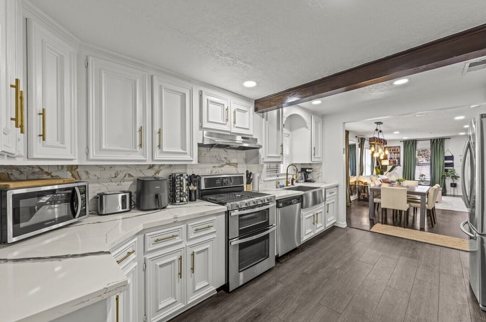 Open flow from kitchen to dining — no walls between the chef and the conversation.