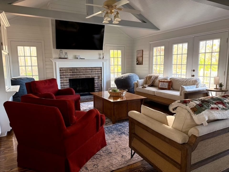 Spacious living room with seating for the whole group and cozy fireplace. 