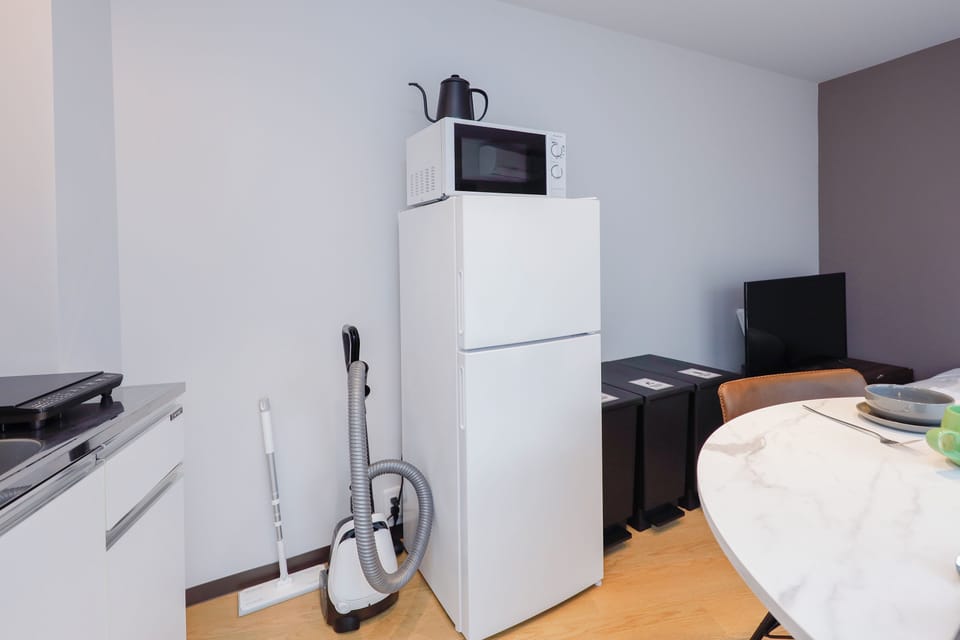 Apartment, Non Smoking (201) | Living area | Flat-screen TV