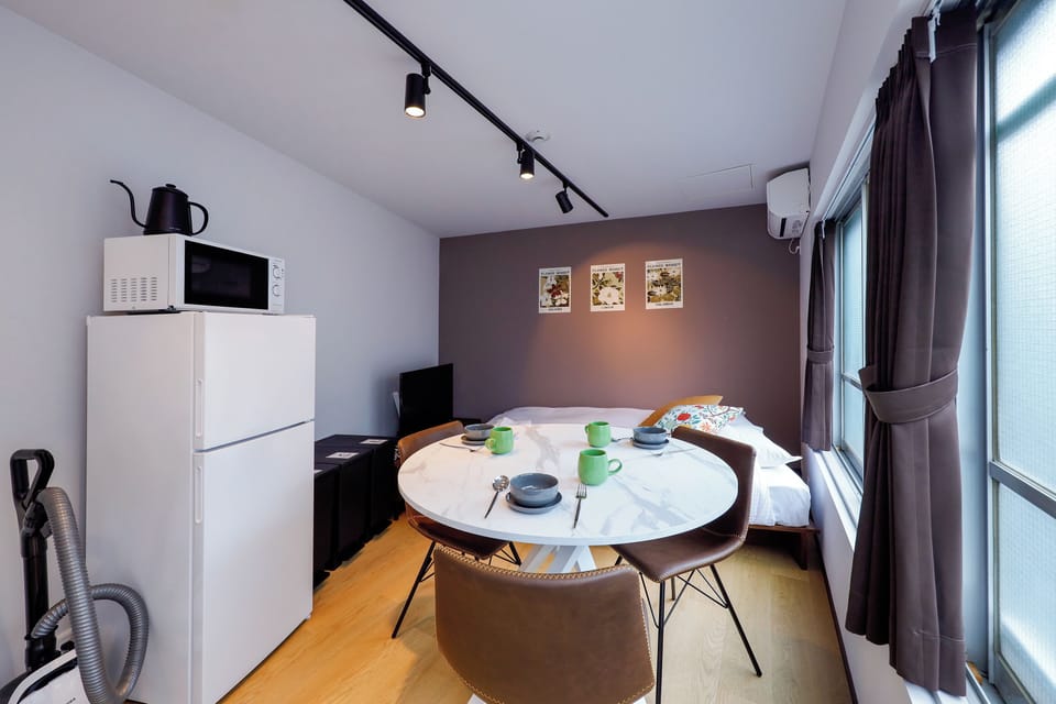 Apartment, Non Smoking (201) | Living area | Flat-screen TV