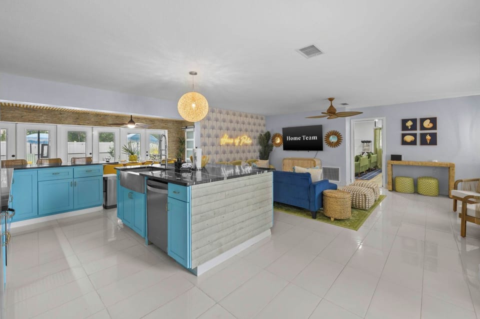 Where everyone can be together—our open floor plan seamlessly connects the living room and kitchen, so no one ever misses a moment (or a snack!).