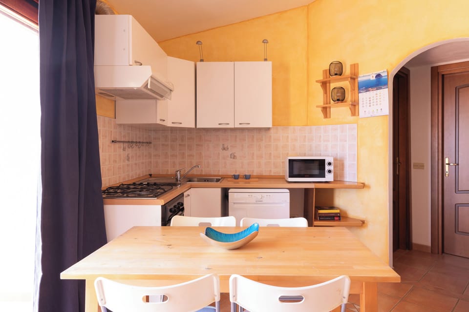 Apartment, 2 Bedrooms | Private kitchen | Fridge, microwave, oven, stovetop