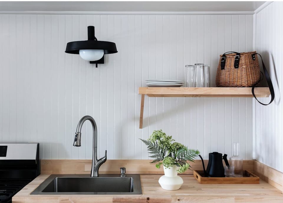 Prepare easy bites on warm wood counters, beautifully styled.