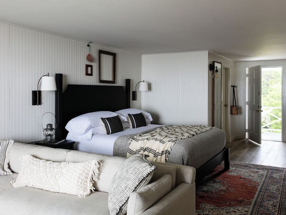 Unwind in a calm, spacious room with plush pillows.