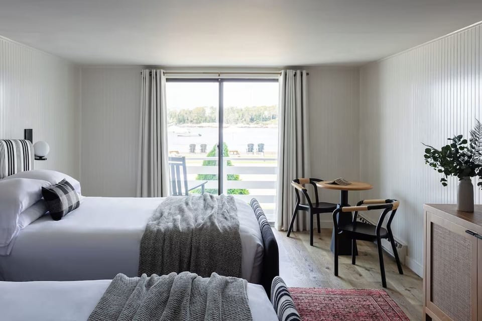Enjoy coffee at the table with a sparkling water view.