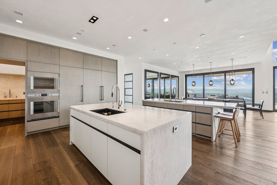 designer custom marble island with sink and storage