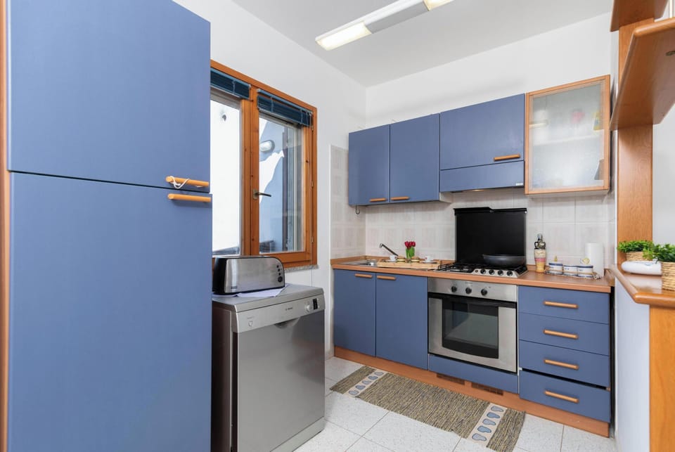 Standard Townhome, Multiple Bedrooms (La Guzzetta Stintinese) | Private kitchen | Fridge, microwave, oven, stovetop