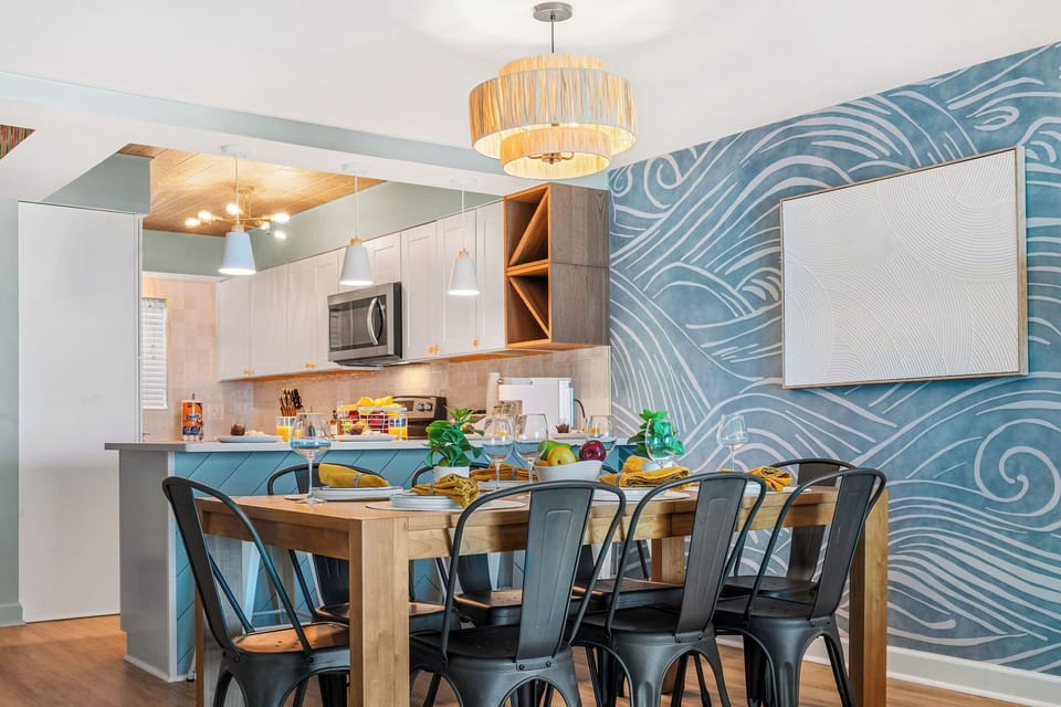 From waffles to late-night snacks, the kitchen and dining space is designed for real families—messy, hungry, and always making memories.