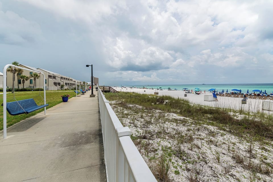 Swing, sip, and watch the waves. These beachside benches are your invitation to slow down and soak up the simple joys.