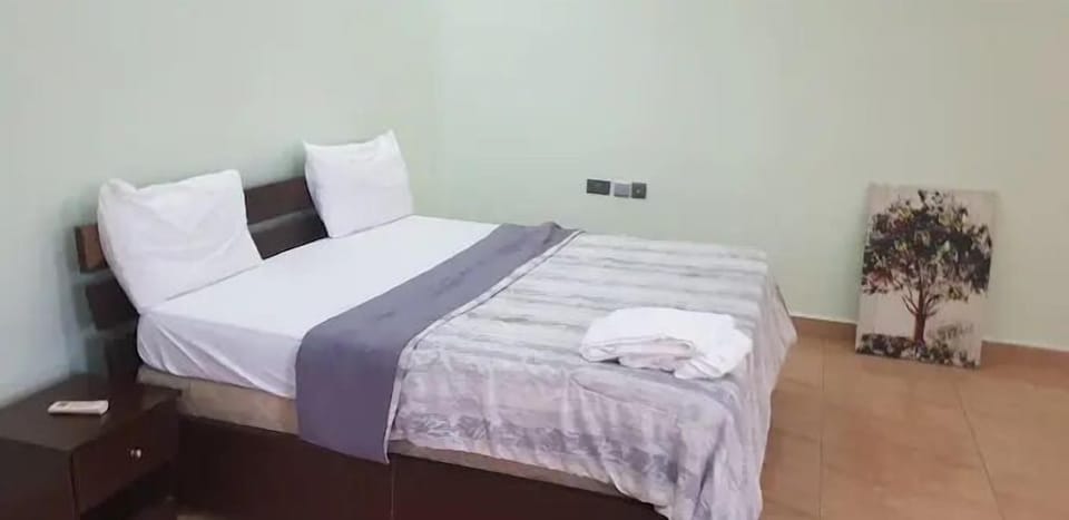 Family Apartment, Balcony, City View | Desk, laptop workspace, blackout drapes, soundproofing