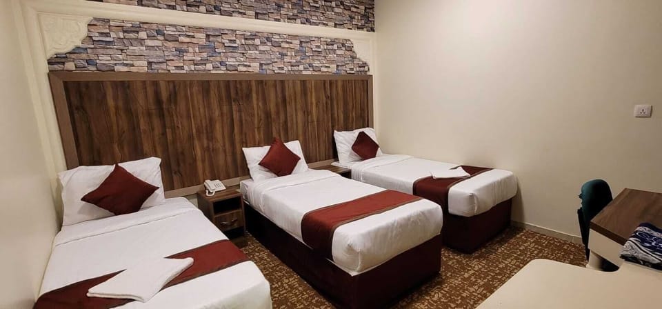 Triple Room | Premium bedding, in-room safe, bed sheets