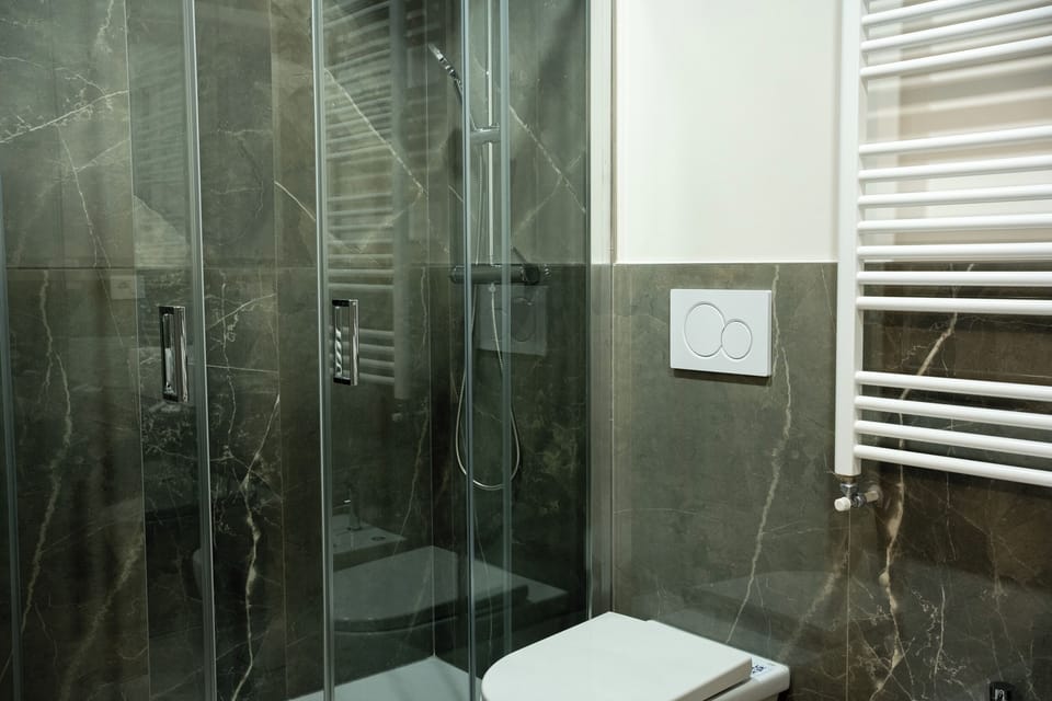 Standard Room | Bathroom | Shower, hair dryer, bidet, towels