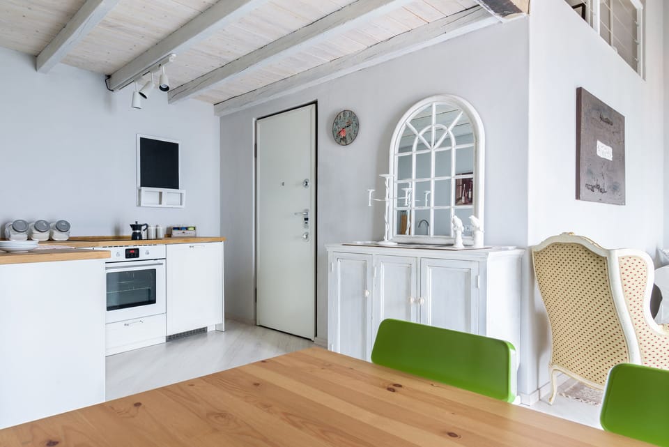 Apartment, Lake View | Private kitchen | Fridge, microwave, oven, stovetop