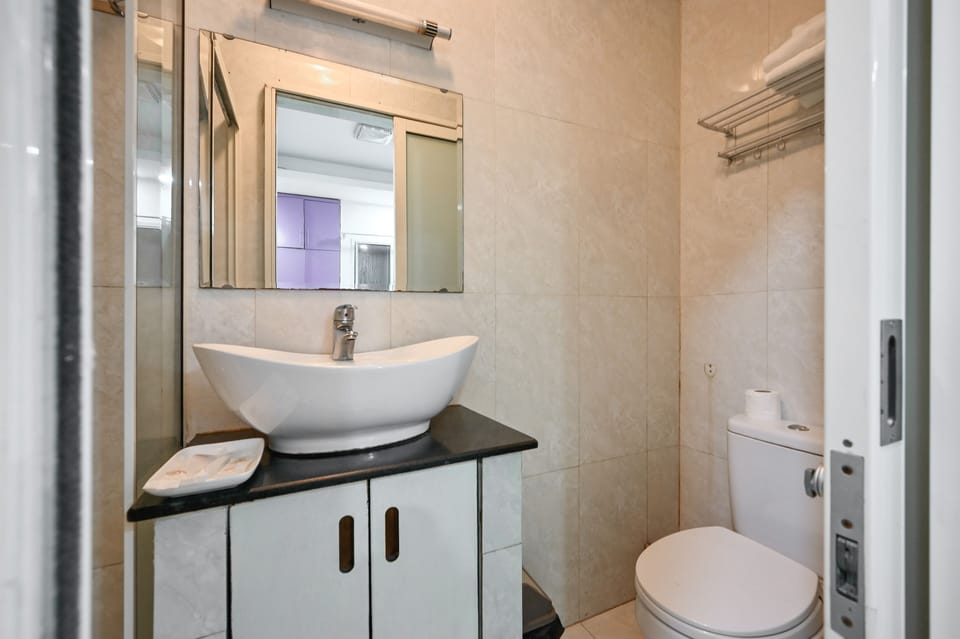 Shower, slippers, bidet, towels