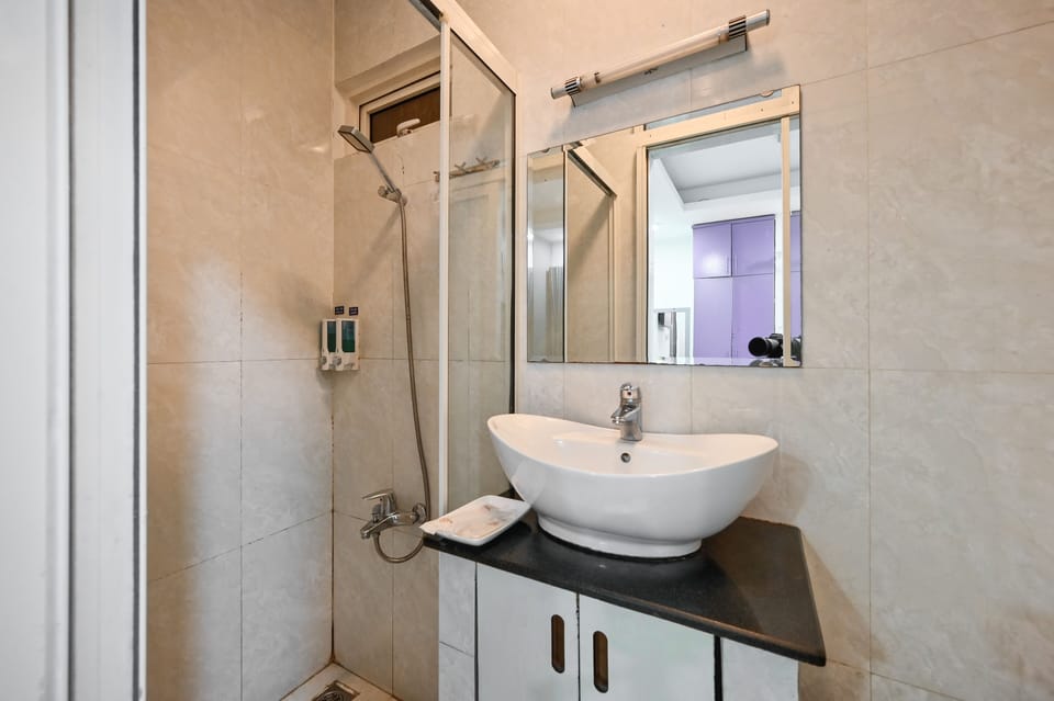 Shower, slippers, bidet, towels