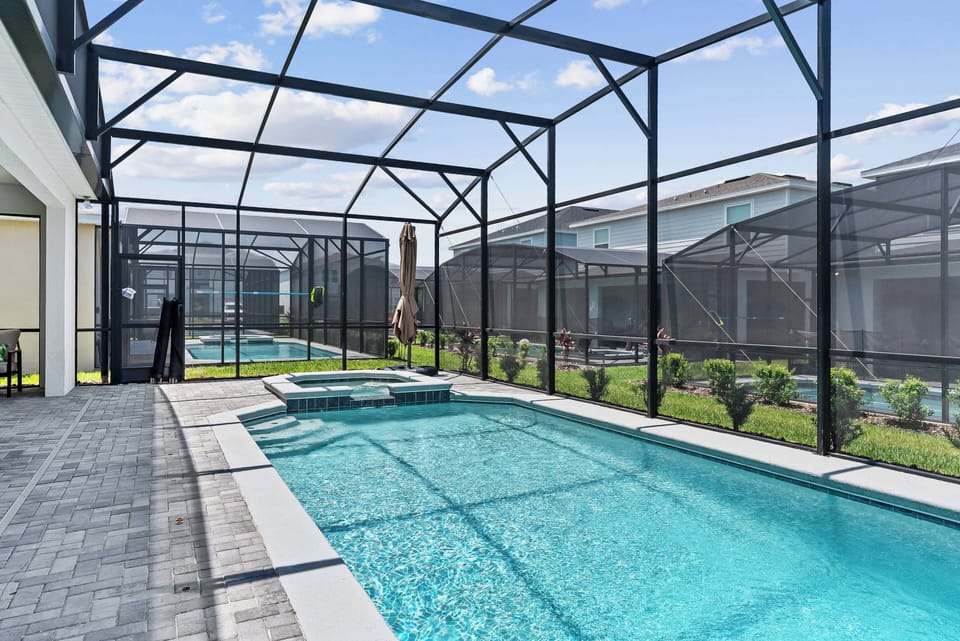 Relax by your private pool, surrounded by lush greenery and the soothing sounds of nature. Enjoy the sparkling water and sleek stonework as you bask in the sun and unwind in ultimate comfort.