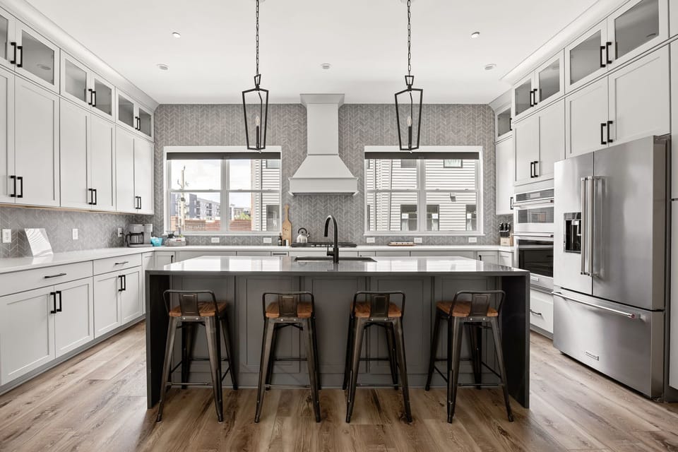 Spacious Kitchen with Breakfast Bar | Casual Seating for Coffee, Cocktails, and Late-Night Snacks