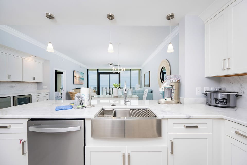 Upgrade your culinary experience in this elegant kitchen and enjoy meals with a beachfront view