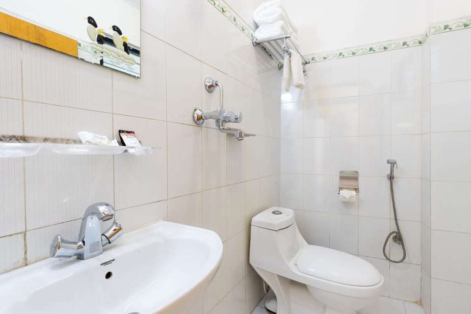 Shower, free toiletries, slippers, towels