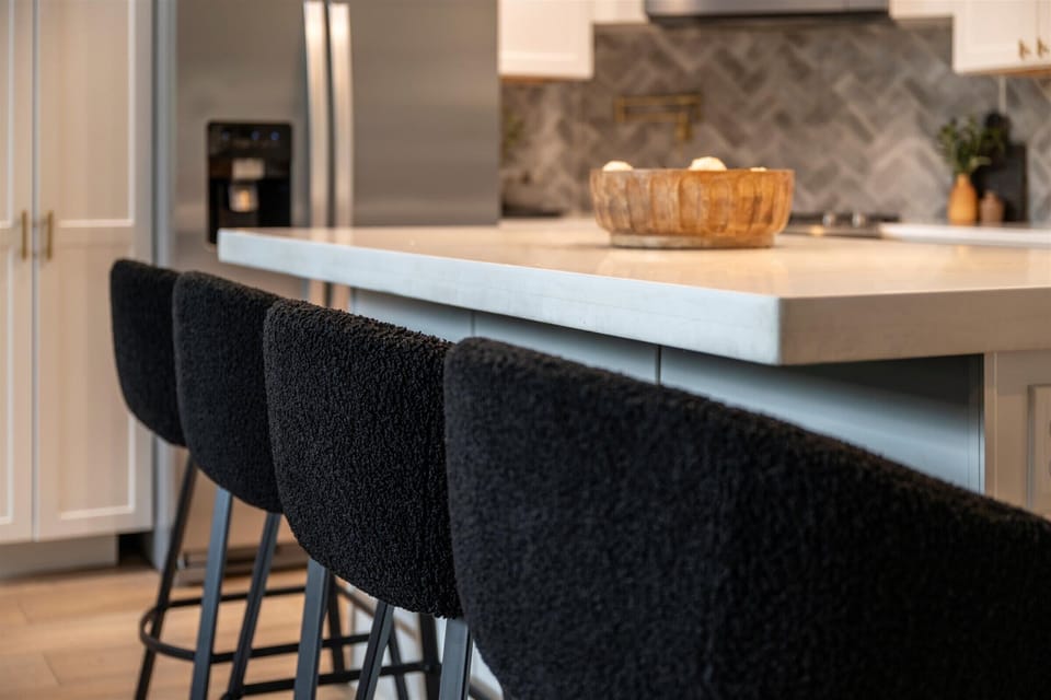 Grab a seat at the island — perfect for morning coffee or casual meals.