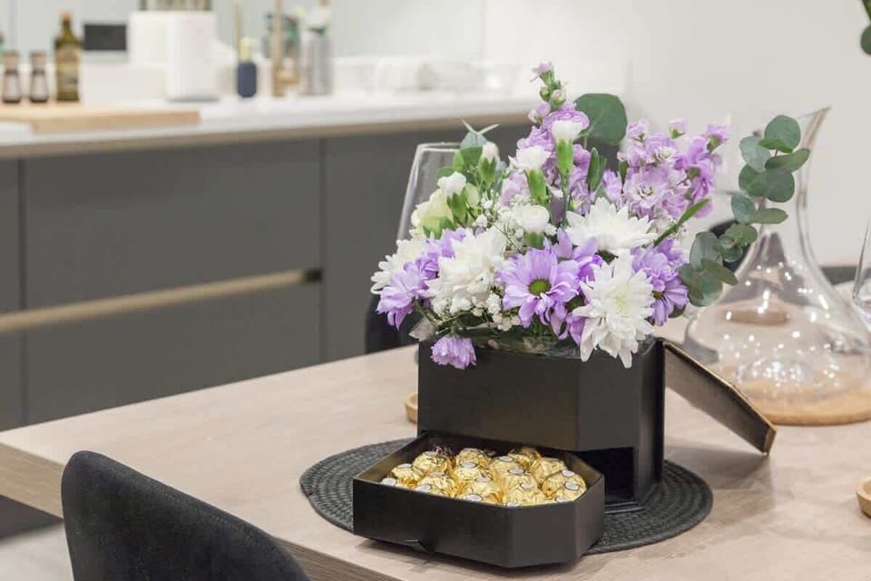 The dining area is a designated space for meals, typically featuring a table and seating.