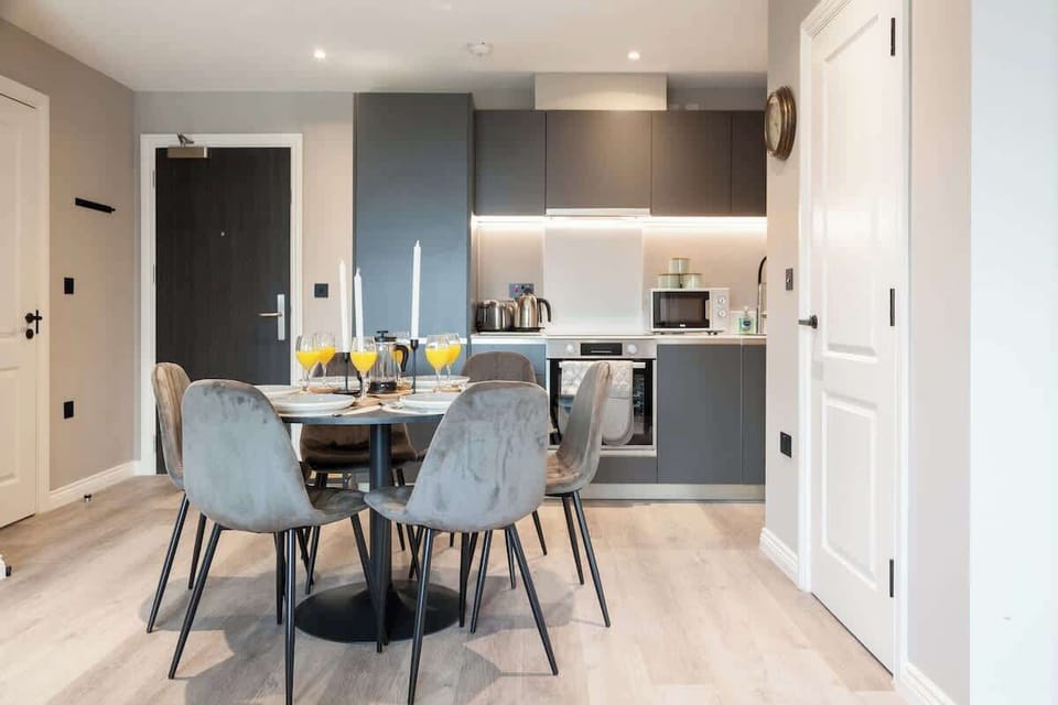 Gather around this elegant dining table, set in a well-lit space that’s perfect for meals, conversations, or a quiet coffee break