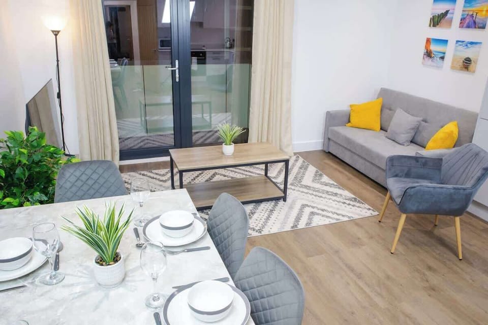 A stylish and functional space designed for enjoying meals, featuring a dining table and comfortable seating.