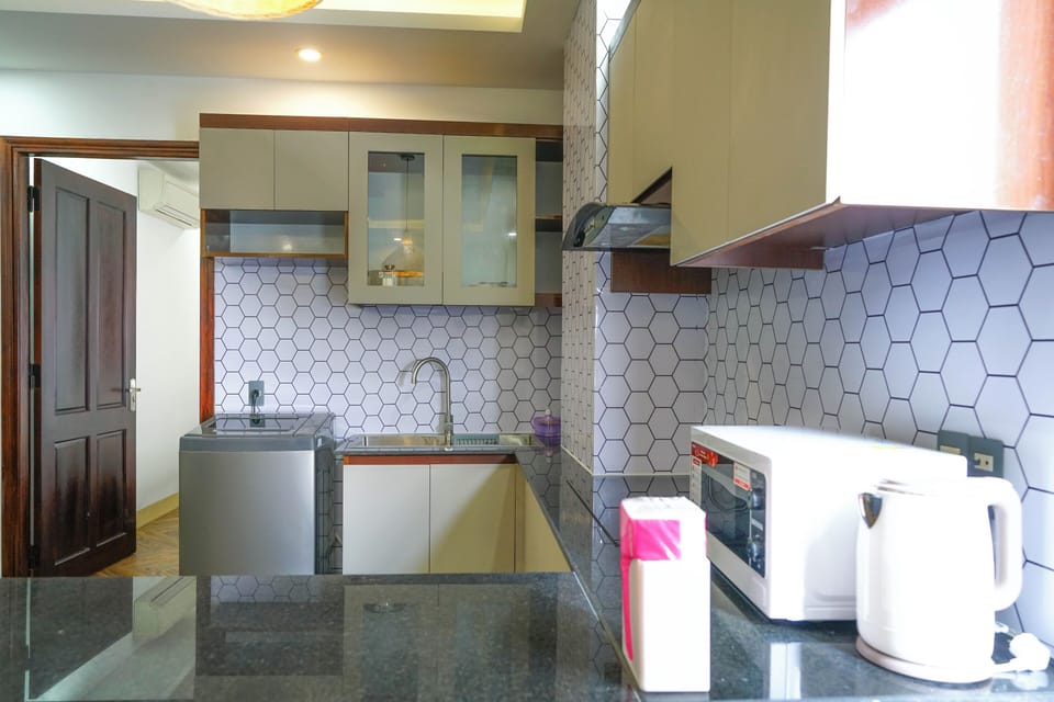Standard Apartment | Private kitchen | Mini-fridge, stovetop