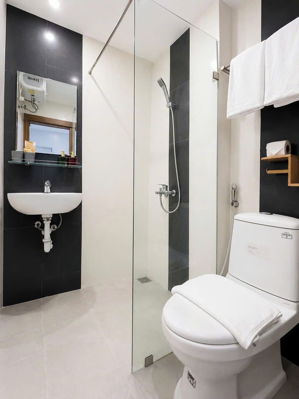 Shower, rainfall showerhead, designer toiletries, hair dryer