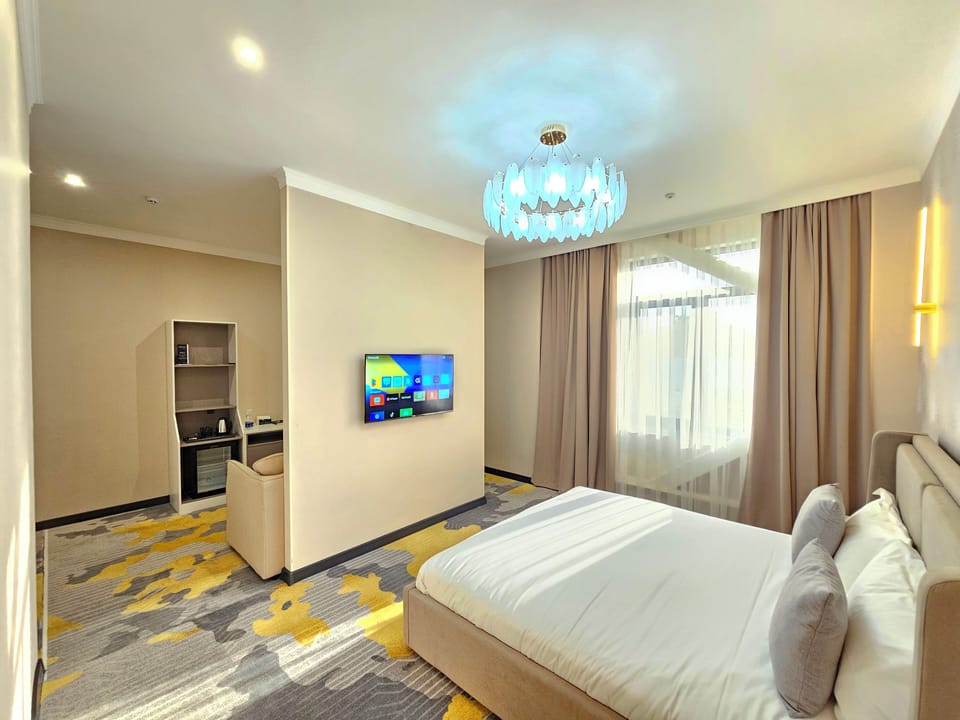 Luxury Suite, City View | Hypo-allergenic bedding, in-room safe, desk, laptop workspace