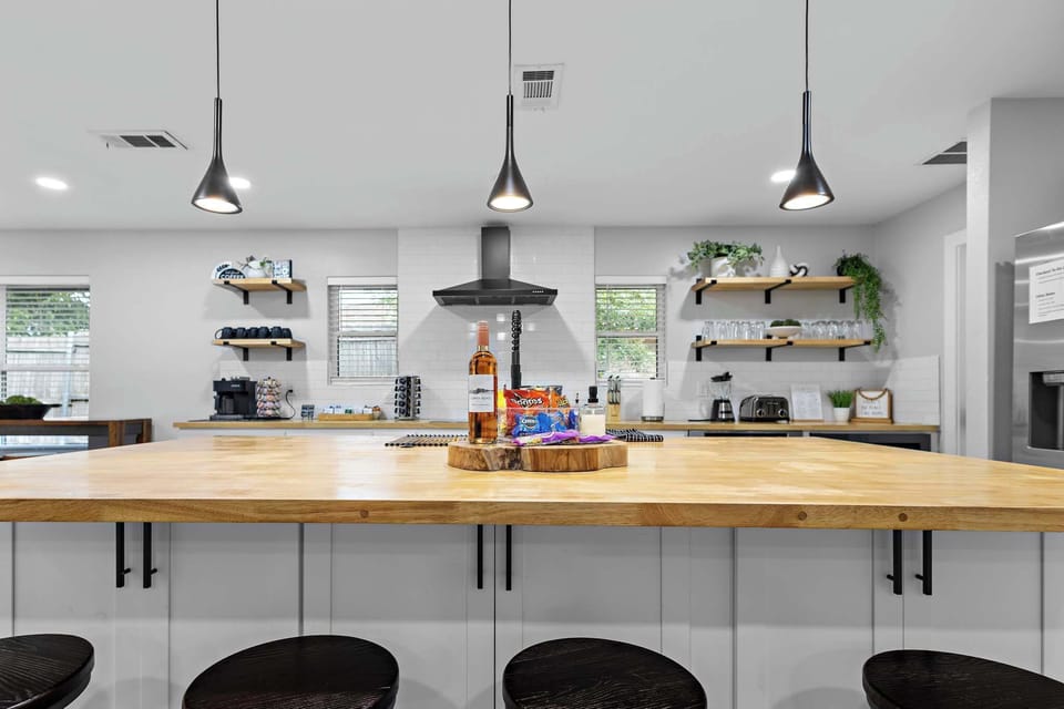 Massive kitchen island with for four bar stools.