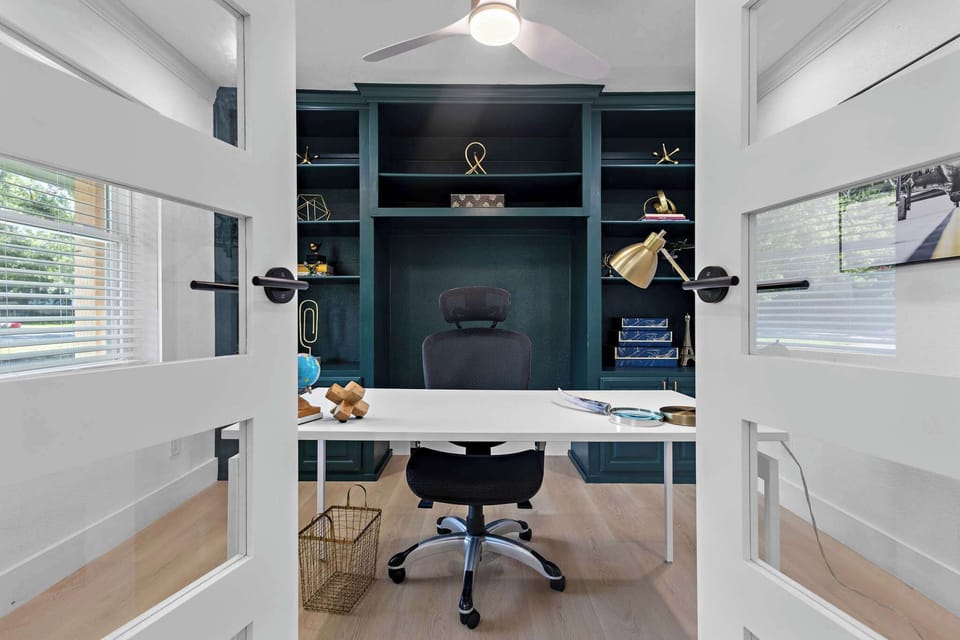 Large office is located downstairs to get some work done.