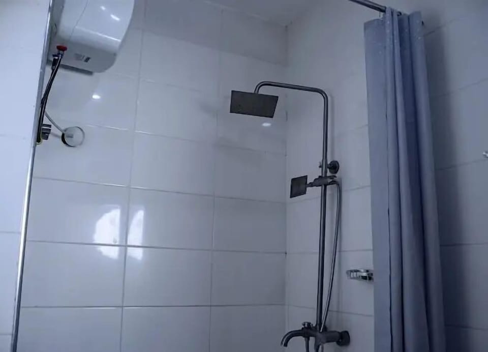 Deluxe Apartment, Balcony, City View | Bathroom | Free toiletries, hair dryer, towels, soap