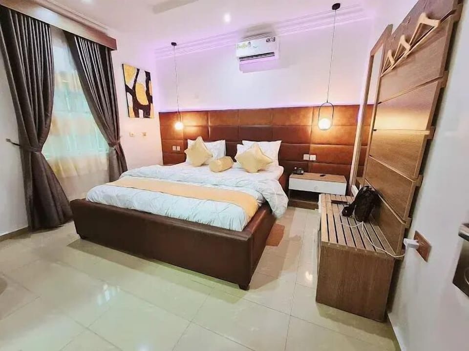 Deluxe Apartment, Balcony, City View | In-room safe, desk, laptop workspace, blackout drapes